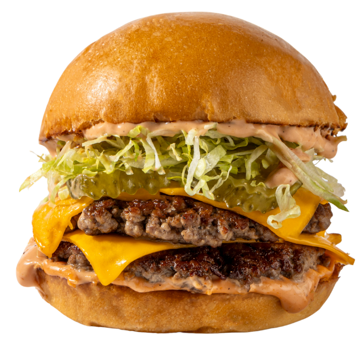 Double smash beef burger with cheddar cheese, pickles, shredded lettuce and Zap sauce on a brioche bun.